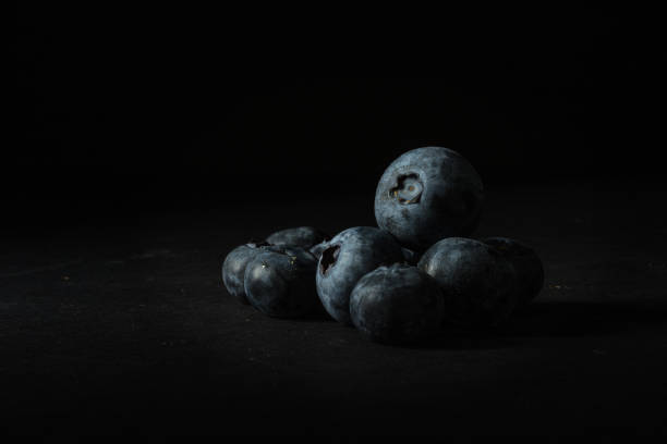 Closeup shot of many blueberries one on another