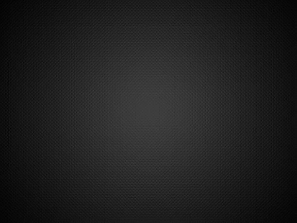 istock Closeup of a carbon fiber background 1440558208