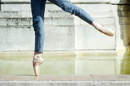 A beautiful shot of ballet dancer's feet dancing on the floor