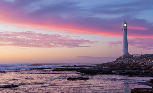 A lighthouse in Cape Town, South Africa at sunset