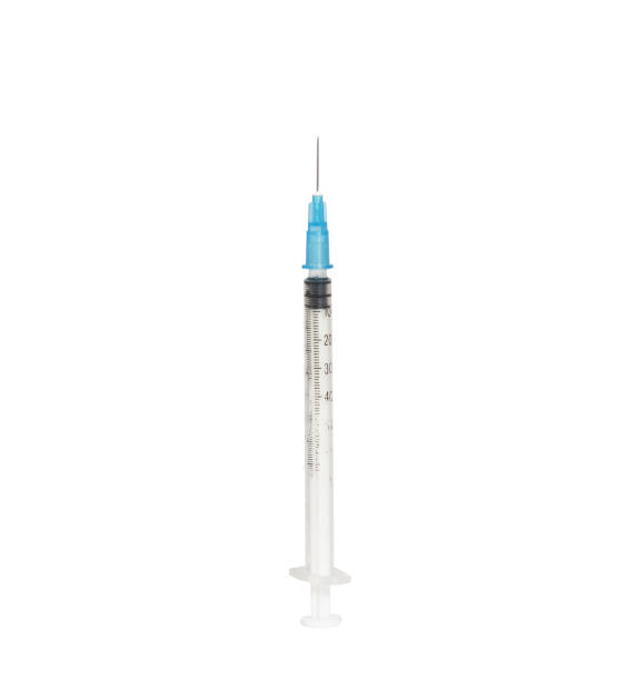 istock Isolated vertical closeup of an empty syringe on a white background 1440559455