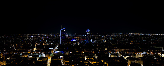 A panoramic view of the illuminated city of Lyon, France at night