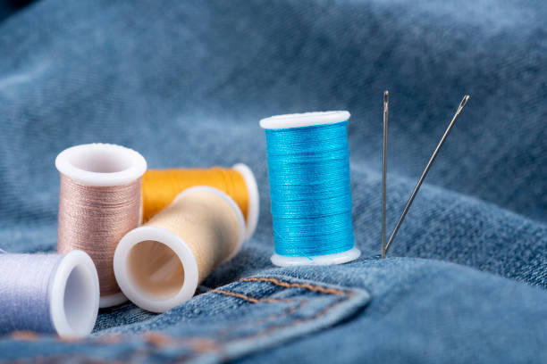 istock Needles, yarn, sewing thread and fabric 1440562340