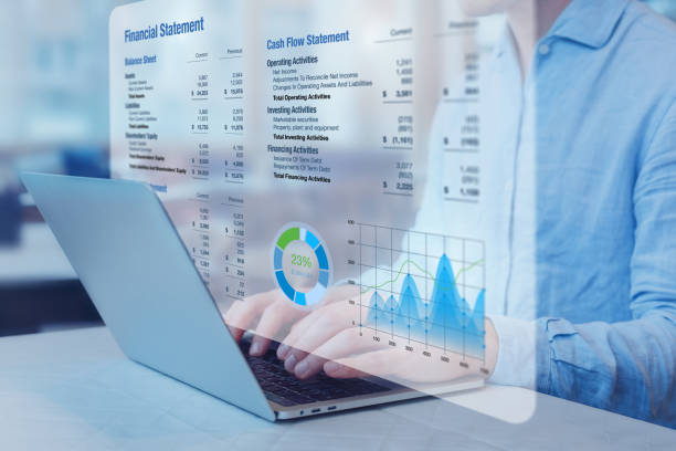 Accountant analysing financial statement with graph on computer. Auditing balance sheet, sales and income report, business operations data, corporate accounts. Finance and consulting. Accountant analysing financial statement with graph on computer. Auditing balance sheet, sales and income report, business operations data, corporate accounts. Finance and consulting. financial report stock pictures, royalty-free photos & images