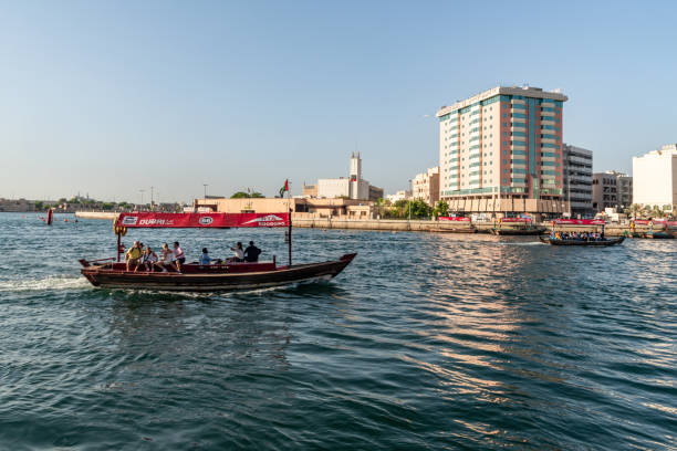 The view while cruising on an Abra - a traditional boat made of wood  - on the Dubai Creek that divides Deira and Bur Dubai