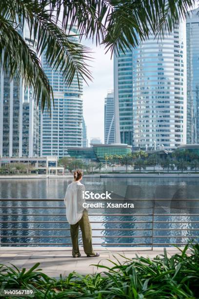 Woman Looking At The Modern Buildings City Life Concept Stock Photo - Download Image Now
