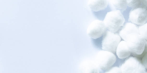 macro cotton wool on a white background,cotton wool isolated on a white background.cleaning cotton swabs for the sick - cotton flower textile macro imagens e fotografias de stock