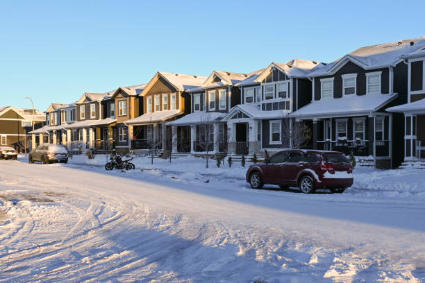 istock Row of houses after snowfall 1440576947