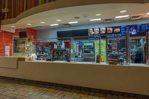 New York. USA. 09.17.2022. Close up view of colorful customers desk of McDonald's restaurant. Fast food concept.
