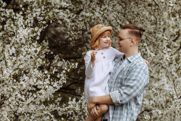 istock Father and little daughter are walking. 1440579338