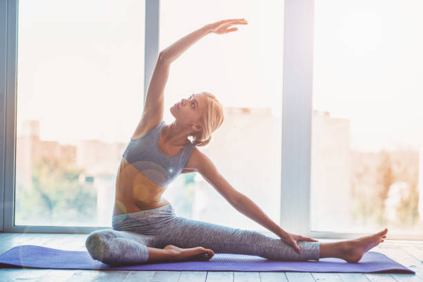 istock Beautiful girl doing yoga 1440583996