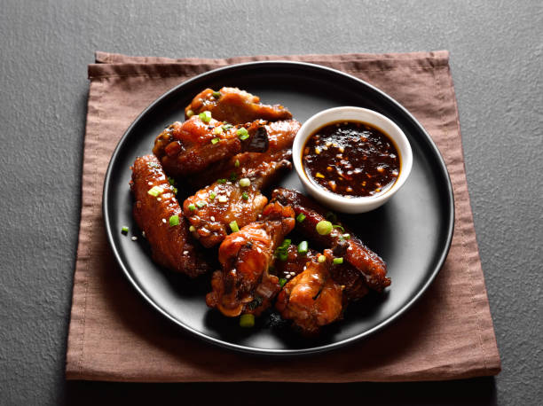 istock Honey-soy chicken wings 1440587118