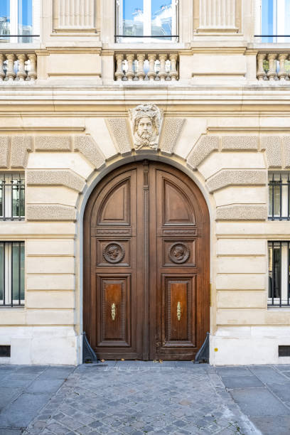 istock Paris, an ancient door, beautiful facade 1440587635