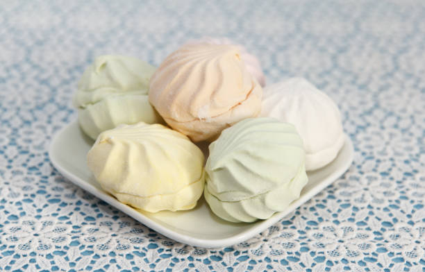 istock Delicious fresh multicolored marshmallow lies on a serviced table in saucer 1440590557