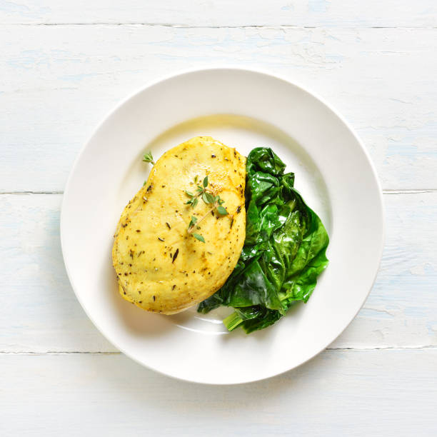 Baked chicken breast with sauteed spinach