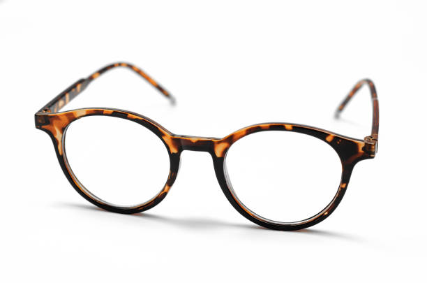 istock Stylish leopard-colored eyeglasses on a white background 1440592253