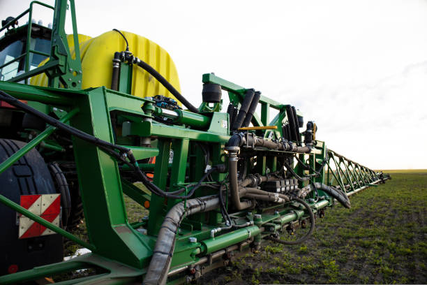 spraying farm on a tractor close-up. - spraying agriculture farm herbicide imagens e fotografias de stock