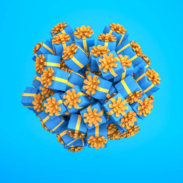 A lot of blue gift boxes with yellow golden ribbon and bow clustered to a ball or planet hovering over a blue background. Abundance concept. stock photo