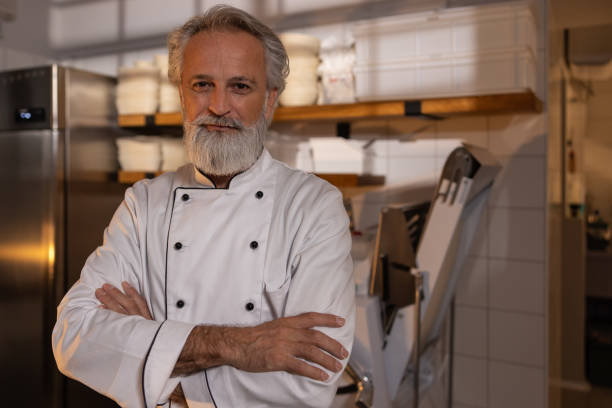 istock A baker prepares bakery products in a bakery. 1440596491
