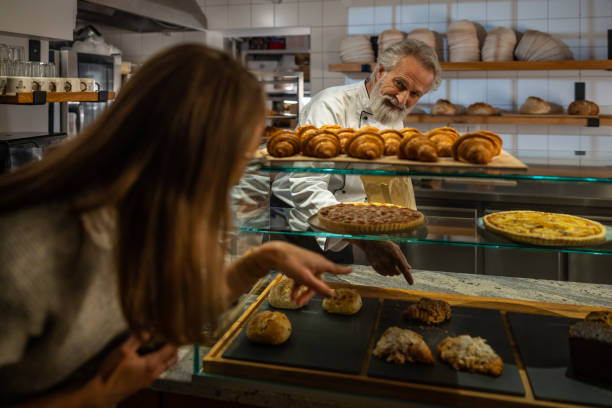 istock A baker prepares bakery products in a bakery. 1440597799
