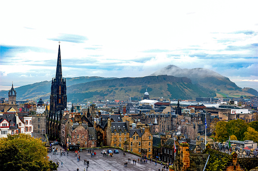 Taken for the entrance to Edinburgh Castle in Edinburgh Scotland, off in the distance is famous Arthur's Seat on the outskirts of town.  This is a favorite site for tourists who come to visit Edinburgh.