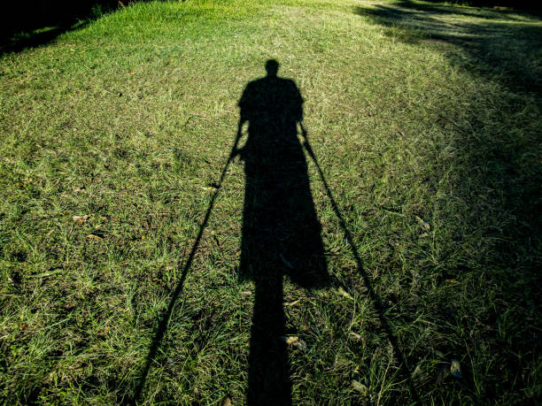 Shadow of a disabled person. stock photo