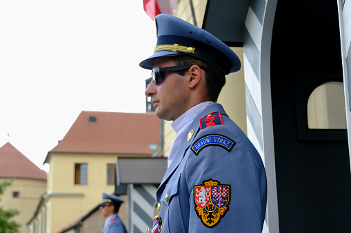 Presidential guard soldier in the guard booth during changing of the guard ceremony in Prague, Czech Republic on July 27, 2022.