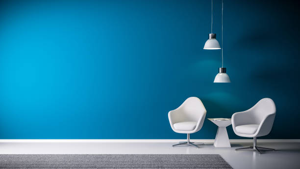 white chairs in front of blue wall