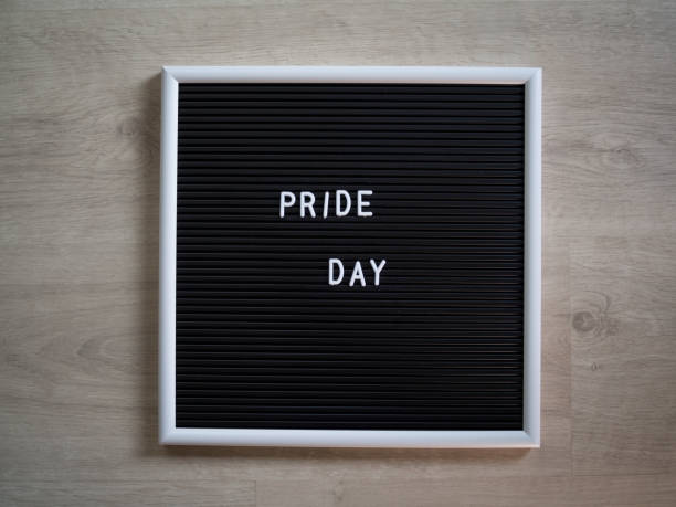 istock Pride day letters and words spelled out on a board 1440612119