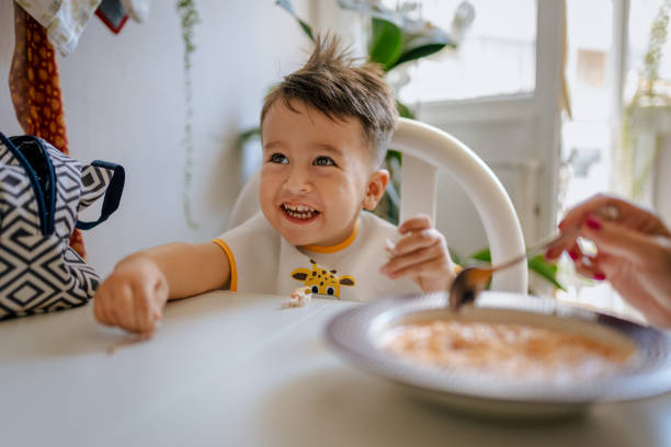 istock Baby Boy eating breakfast 1440612187