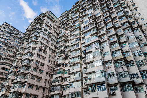 Old crowded apartment in Quarry Bay, Hong Kong, daytime