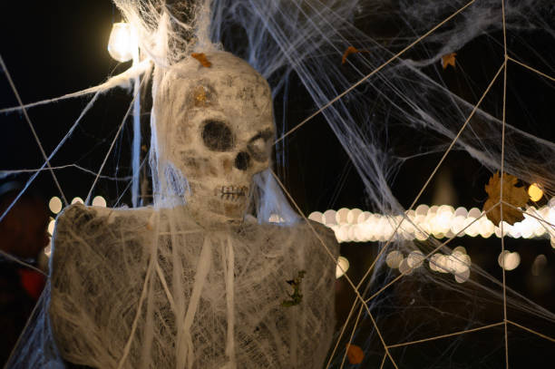 istock Skeleton decoration for Halloween wrapped in spider web and tissue 1440614694