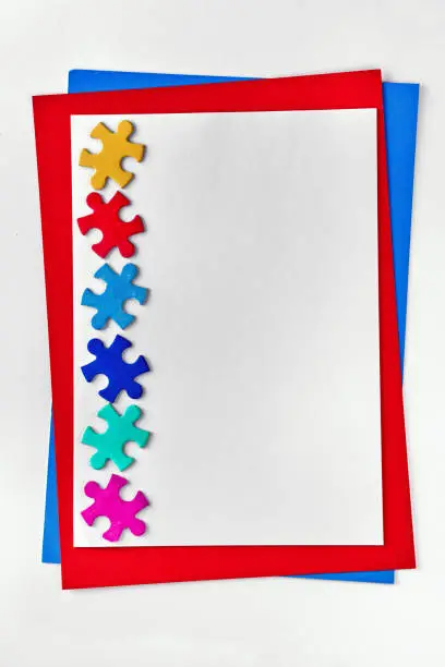 Autism Awareness Day, World Autism Day, frame with puzzle pieces, copy-space. Banner, wallpaper, background for flyer or poster. Health Care Awareness campaign design.