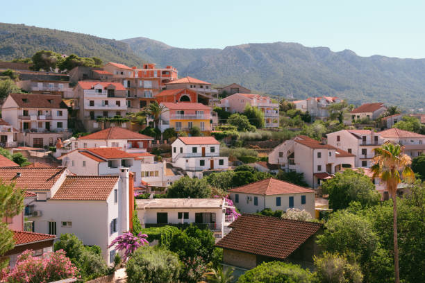 Jelsa, Hvar island in Croatia. The scenic summer day view of the city of Jelsa. Jelsa, Hvar island in Croatia, panoramic banner image. Scenic summer day panorama view of the city of Jelsa. jelsa stock pictures, royalty-free photos & images