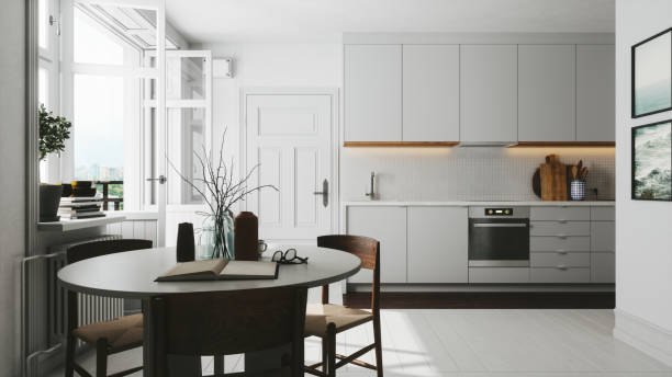 Scandinavian Style Kitchen Interior of a Scandinavian style kitchen with dining table. dining room stock pictures, royalty-free photos & images