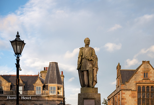 9 November 2022. Huntly,Aberdeenshire,Scotland. This is the monument for Charles Gordon Lennox in the Square at Huntly Town Centre as the sun was setting for the day.