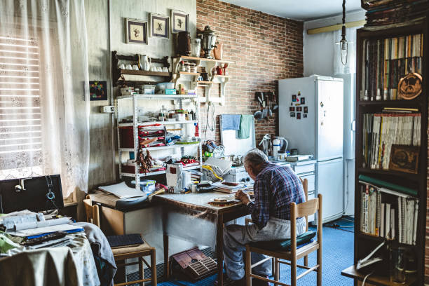 istock Senior man having a meal 1440625690