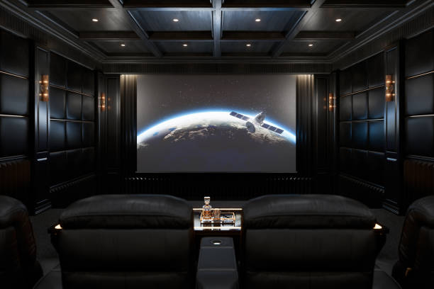 Private Luxury Home Cinema Room The interior of the private movie theater of a luxury mansion with leather recliners, built-in ceiling speakers and large projection screen.
(World map texture courtesy of NASA: https://visibleearth.nasa.gov/view.php?id=55167) entertainment center stock pictures, royalty-free photos & images