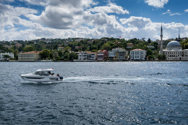Istanbul, Turkey-September 5,2021: Touristic boat in Golden Horn bay. Panoramic view to Bosphorus