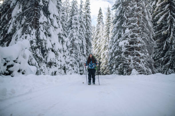 istock Woman hiking in the winter. 1440641399
