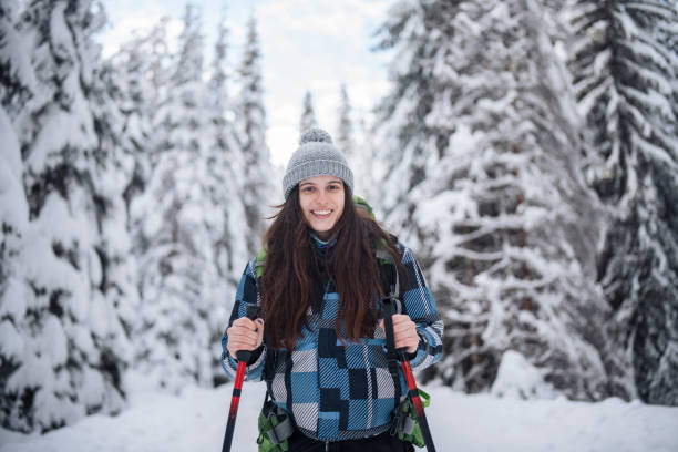 istock Beautiful woman on a winter hike. 1440641536