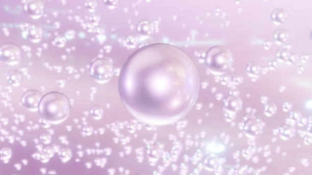 istock 3D cosmetic rendering Pink Bubbles of serum on a fuzzy background 1440642514