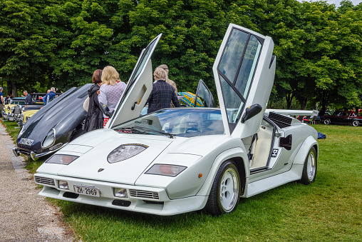 Baden-Baden, Germany - 14 July 2019: white Lamborghini Countach 1974 1990 sport car, oldtimer meeting in Kurpark.