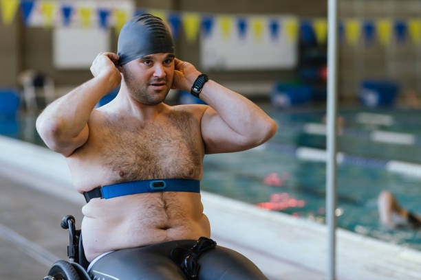 istock Mature Male Adaptive Athlete Training At Pool 1440646655