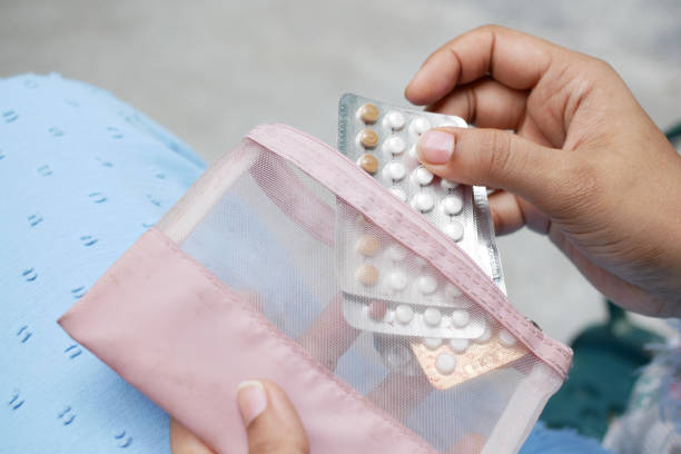 istock female hand golding birth control pills 1440648012