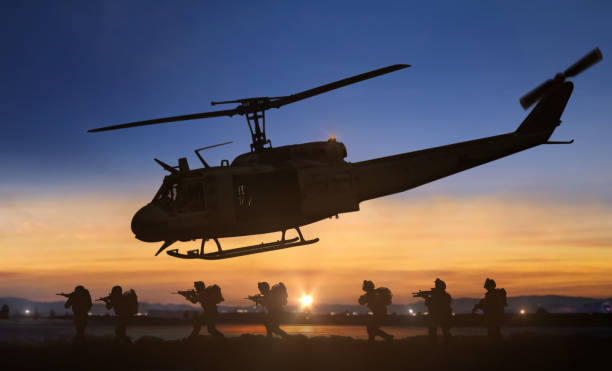 istock Military special forces helicopter drops operation at sunset 1440650489