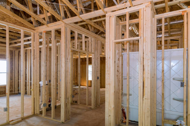 istock Currently, a new building is under construction and there is an acrylic bathtub installed in the new bathroom of an unfinished house that is under construction 1440652905