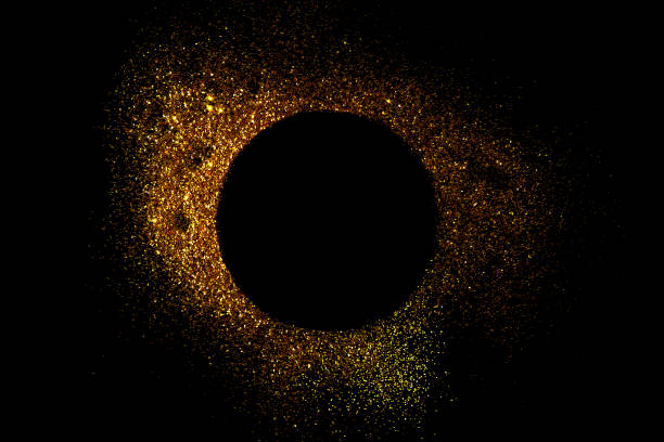 istock Dark texture with a round sprinkling of gold. backdrop with golden sparkle for frame, copy space, and overlay photo effect. fancy, luxury, themed backgrounds. 1440653329