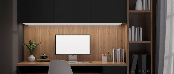 istock Modern home workspace in the evening with computer mockup and stationery on wood built-in table. 1440655883