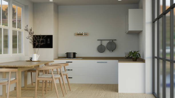 istock Modern Scandinavian home kitchen cooking space with dining table interior design 1440656129
